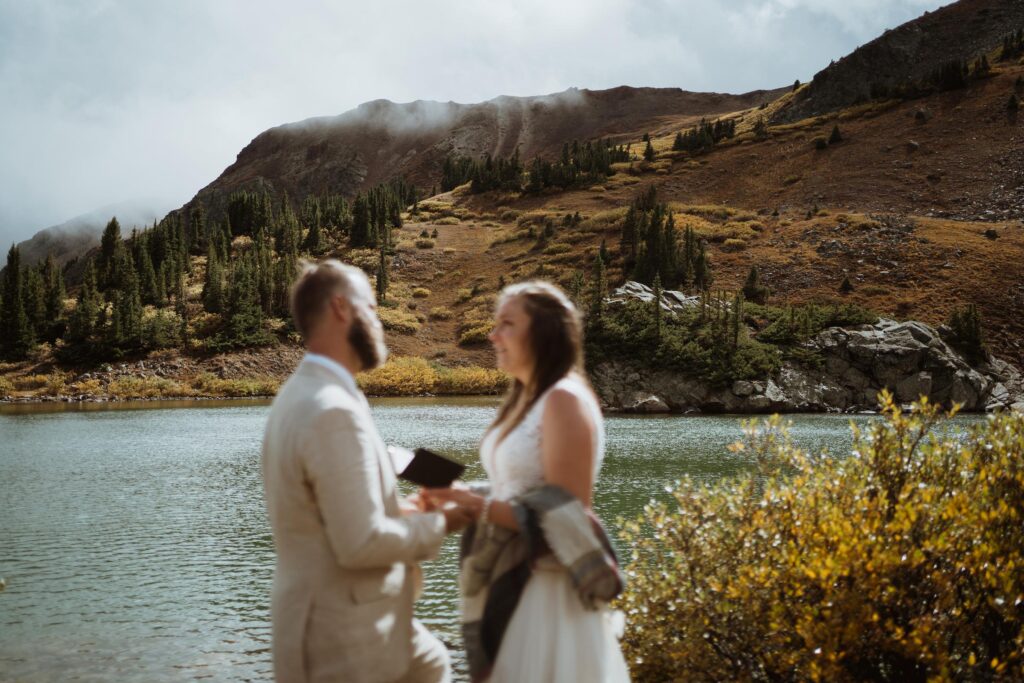 Alpine lake vows and elopement. Eloping in Buena Vista. Planning a Buena Vista elopement in the fall. With hiking, champagne pops, and private vows.
