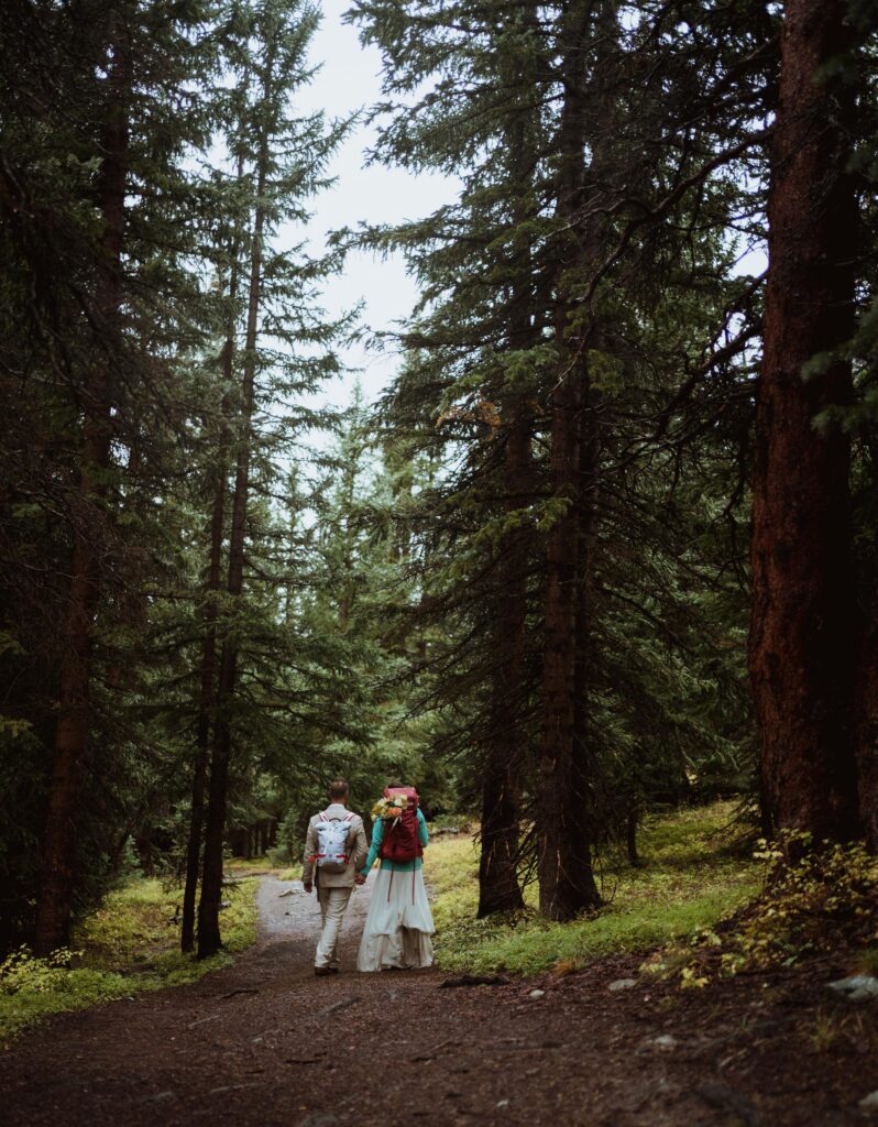Hiking elopement in Buena Vista in the fall. Adventure wedding in Colorado Rocky Mountains.