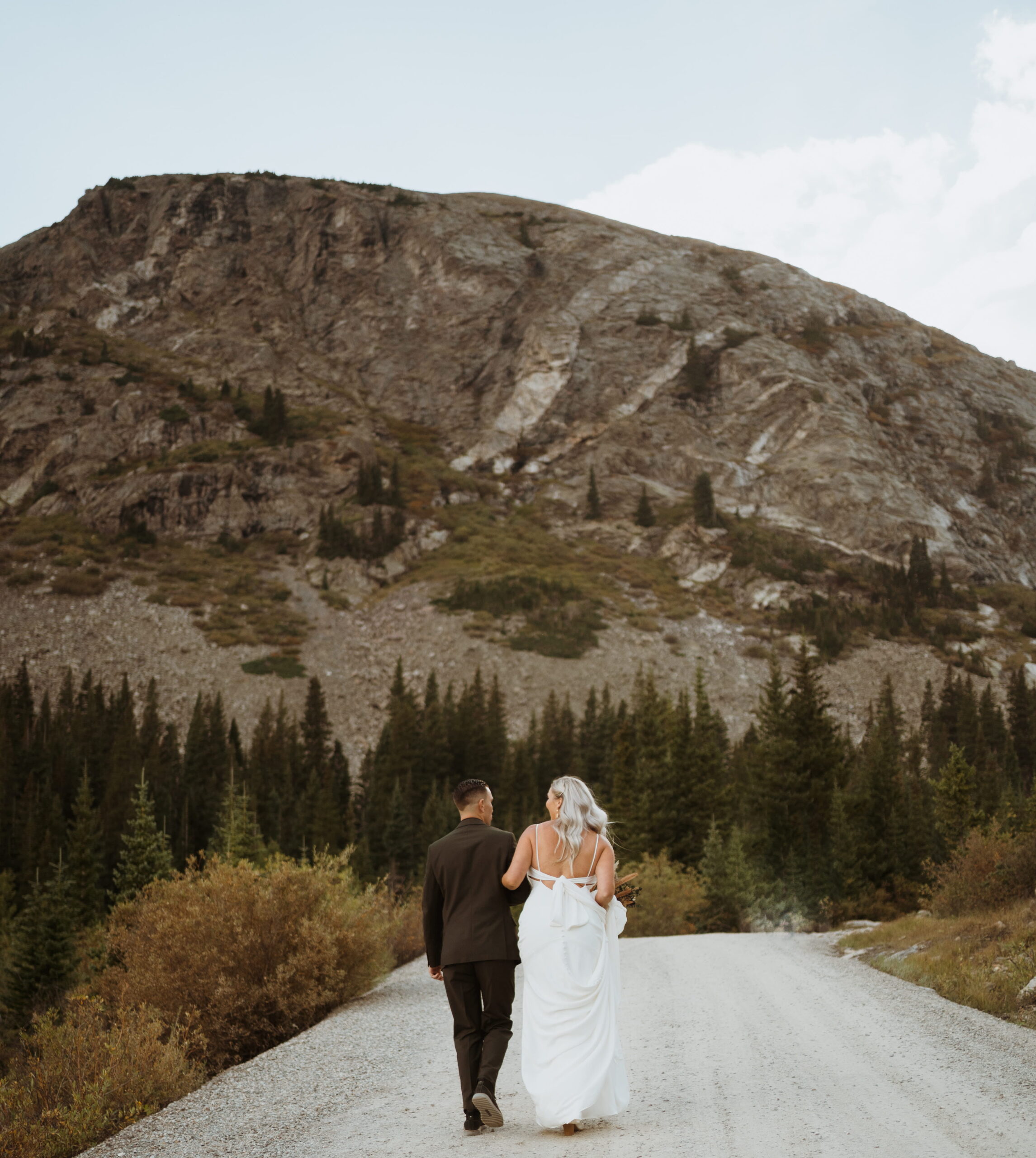 summer breckenridge elopement. hiking elopement at an alpine lake with first dances, vows overlooking the mountains, and portraits.
