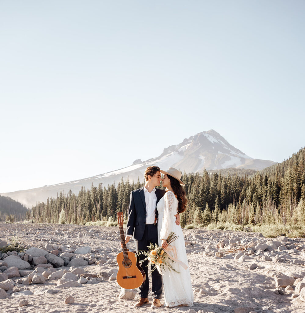 Dana and Jake's Mt. Hood Oregon elopement. They hiked, said private vows, spent time playing music, relaxing, and taking in the sunset.